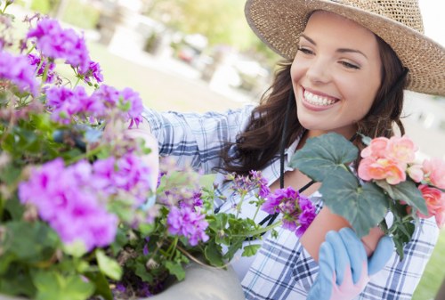 Seasonal garden maintenance in Highams Park with hedge trimming